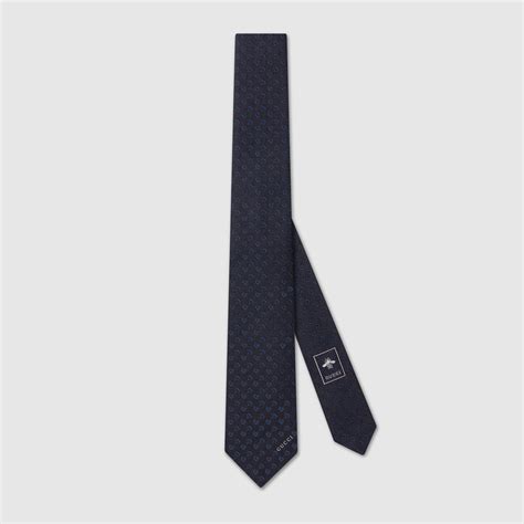 Horsebit silk jacquard tie in navy .